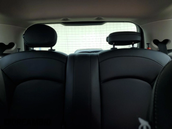2014 MINI Hardtop with VIN WMWXM5C51ET934047, listed as a Copart auction lot 63039335 with 104,446 mi miles and Salvage title. Bid and sale history available at DreamBid. Image 10.