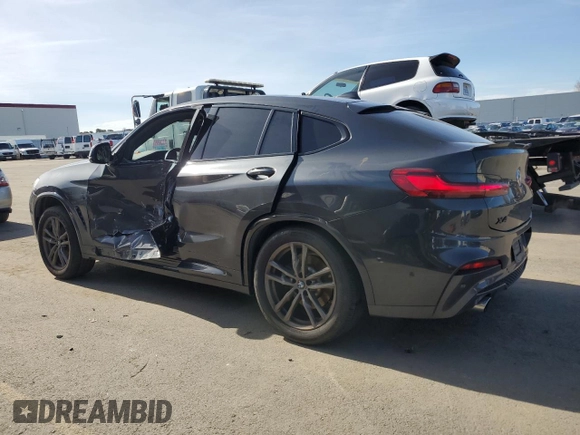 2020 BMW X4 xDrive30i with VIN 5UX2V1C04L9C32419, listed as a Copart auction lot 46427975 with 58,623 mi miles and Salvage Title. Bid and sale history available at carsss.com. Image 2.