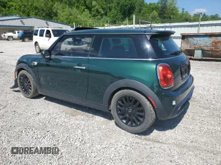 2014 MINI Hardtop S with VIN WMWXM7C50ET970033, listed as a Copart auction lot 56160735 with 125,208 mi miles and Salvage title. Bid and sale history available at DreamBid. Image 2.