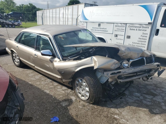 2002 Jaguar XJ VDP with VIN SAJDA24CX2LF45014, listed as a Copart auction lot 56015444 with 0 mi miles and Salvage Title. Bid and sale history available at carsss.com. Image 4.