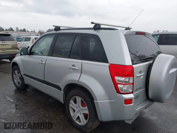 2006 Suzuki Grand Vitara Luxury z VIN JS3TE947964103091, wystawiony jako IAAI lot #41658953 z przebiegiem 221 696 mil mil oraz . Historia ofert i sprzedaży dostępna na DreamBid. Obrazek 3.