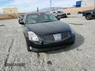 2004 Nissan Maxima SL with VIN 1N4BA41E24C924280, listed as a Copart auction lot 81564284 with 30,679 mi miles and Salvage Title. Bid and sale history available at DreamBid. Image 11.