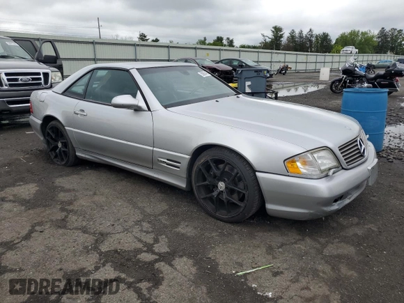 1999 Mercedes-Benz SL 500 with VIN WDBFA68F1XF177603, listed as a Copart auction lot 58983485 with 120,737 mi miles and Salvage title. Bid and sale history available at DreamBid. Image 4.