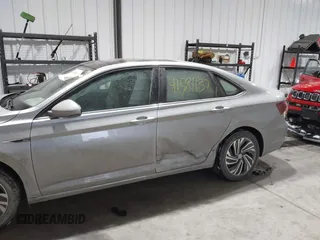 2020 Volkswagen Jetta SEL z VIN 3VWE57BU0LM087350, wystawiony jako IAAI lot #41581637 z przebiegiem 60 528 mil mil oraz . Historia ofert i sprzedaży dostępna na DreamBid. Obrazek 6.