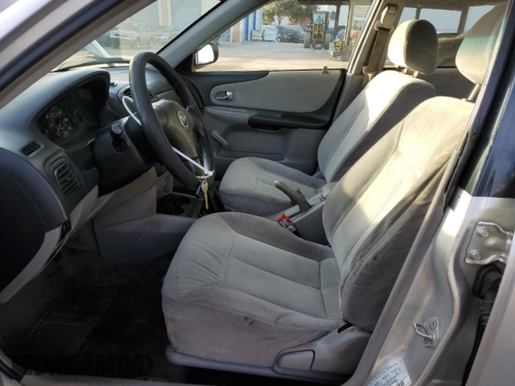 2002 Mazda Protege DX with VIN JM1BJ225120605237, listed as a Copart auction lot 49331225 with 184,556 mi miles and Salvage Title. Bid and sale history available at DreamBid. Image 7.