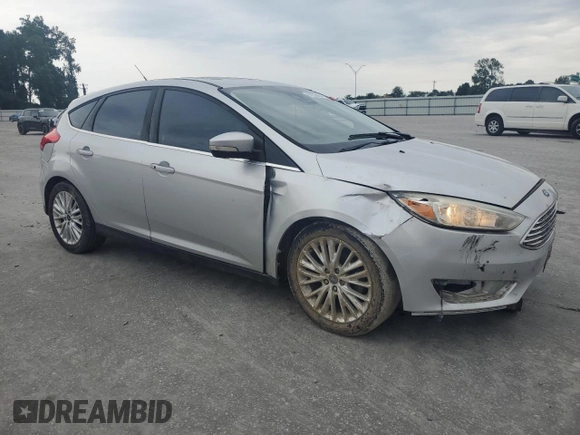 2017 Ford Focus Titanium with VIN 1FADP3N27HL251297, listed as a Copart auction lot 67373094 with 104,733 mi miles and Salvage Title. Bid and sale history available at carsss.com. Image 4.