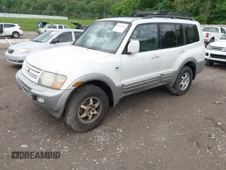 2002 Mitsubishi Montero Limited z VIN JA4MW51R02J071877, wystawiony jako IAAI lot #42214274 z przebiegiem 242 762 mil mil oraz . Historia ofert i sprzedaży dostępna na DreamBid. Obrazek 2.