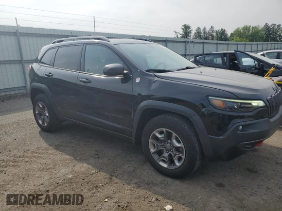 2019 Jeep Cherokee Trailhawk z VIN 1C4PJMBXXKD471338, wystawiony jako Copart lot #59880765 z przebiegiem 59 546 mil mil oraz Szkoda całkowita • Salvage title. Historia ofert i sprzedaży dostępna na DreamBid. Obrazek 4.