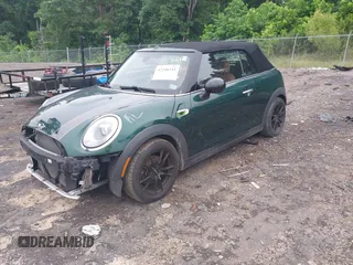 2016 MINI Convertible with VIN WMWWG5C51G3C19231, listed as a IAAI auction lot 42246342 with 93,576 mi miles and . Bid and sale history available at DreamBid. Image 17.