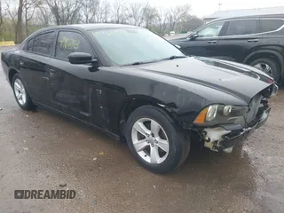 2014 Dodge Charger SE with VIN 2C3CDXBG6EH241332, listed as a IAAI auction lot 41962143 with 152,649 mi miles and . Bid and sale history available at carsss.com. Image 1.