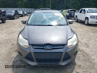 2013 Ford Focus SE z VIN 1FADP3F27DL267203, wystawiony jako IAAI lot #42470614 z przebiegiem 180 153 mil mil oraz . Historia ofert i sprzedaży dostępna na DreamBid. Obrazek 13.