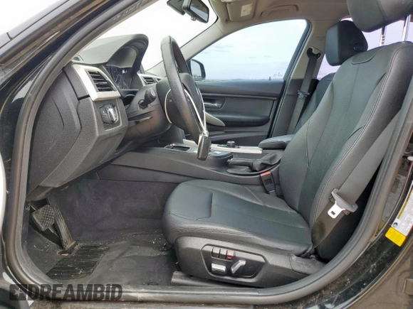 2018 BMW 3 Series 320i with VIN WBA8A9C56JAH12021, listed as a Copart auction lot 58971175 with 100,317 mi miles and Salvage title. Bid and sale history available at DreamBid. Image 7.
