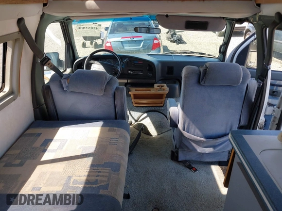 1996 Ford Econoline Cargo z VIN 1FDHS24H9THA55752, wystawiony jako IAAI lot #42052800 z przebiegiem 117 680 mil mil oraz . Historia ofert i sprzedaży dostępna na DreamBid. Obrazek 21.
