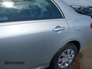 2009 Toyota Corolla with VIN 1NXBU40E49Z060073, listed as a IAAI auction lot 42152619 with 43,540 mi miles. Bid and sale history available at carsss.com. Image 6.