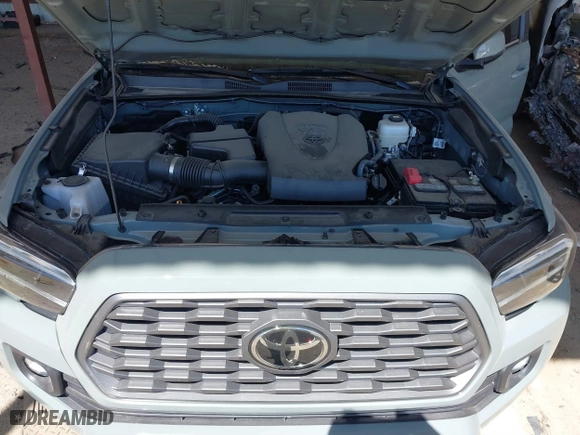 2023 Toyota Tacoma 4WD SR with VIN 3TMCZ5ANXPM613857, listed as a IAAI auction lot 41771957 with 76,232 mi miles. Bid and sale history available at carsss.com. Image 10.