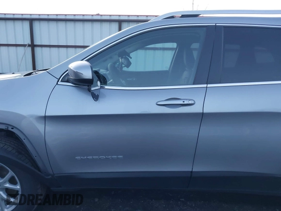 2014 Jeep Cherokee Latitude with VIN 1C4PJMCSXEW220556, listed as a IAAI auction lot 41060501 with 70,152 mi miles and . Bid and sale history available at carsss.com. Image 14.