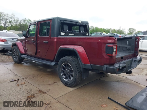 2021 Jeep Gladiator Overland with VIN 1C6HJTFGXML555622, listed as a IAAI auction lot 42237686 with 62,358 mi miles and . Bid and sale history available at DreamBid. Image 3.