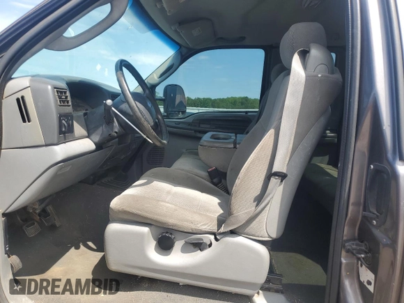 2004 Ford F-250 XL z VIN 1FTNX21P54EB05392, wystawiony jako Copart lot #57982065 z przebiegiem 244 312 mil mil oraz Czysty tytuł • Clean title. Historia ofert i sprzedaży dostępna na DreamBid. Obrazek 7.