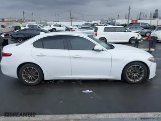 2019 Alfa Romeo Giulia with VIN ZARFAMANXK7600498, listed as a IAAI auction lot 41777643 with 100,492 mi miles. Bid and sale history available at carsss.com. Image 13.