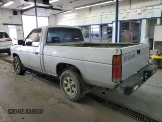 1987 Nissan Hardbody E z VIN JN6ND11S1HW006640, wystawiony jako Copart lot #78160004 z przebiegiem 403 406 mil mil oraz Szkody całkowita. Historia ofert i sprzedaży dostępna na DreamBid. Obrazek 2.