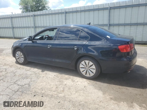 2014 Volkswagen Jetta SE with VIN 3VWD17AJ1EM366484, listed as a Copart auction lot 56331985 with 204,601 mi miles and Salvage title. Bid and sale history available at DreamBid. Image 2.