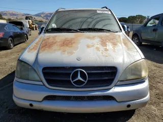 2000 Mercedes-Benz M-Class with VIN 4JGAB72E5YA173269, listed as a Copart auction lot 71520714 with 239,248 mi miles and Clean Title. Bid and sale history available at carsss.com. Image 5.