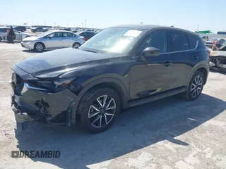 2018 Mazda CX-5 Grand Touring with VIN JM3KFADM8J0330035, listed as a IAAI auction lot 41878680 with 62,632 mi miles. Bid and sale history available at carsss.com. Image 18.