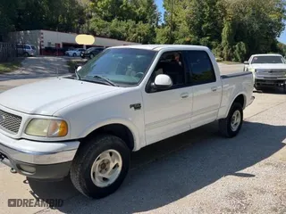 2001 Ford F-150 SuperCrew XLT with VIN 1FTRW08L91KC28928, listed as a Copart auction lot 74771894 with 230,473 mi miles and Clean Title. Bid and sale history available at carsss.com. Image 2.