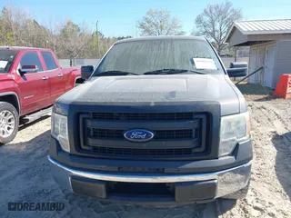 2014 Ford F-150 XL with VIN 1FTMF1CM3EFC57890, listed as a IAAI auction lot 41908369 with 228,743 mi miles. Bid and sale history available at carsss.com. Image 13.