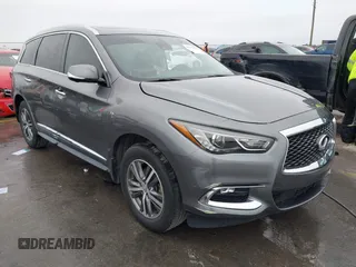 2020 Infiniti QX60 LUXE with VIN 5N1DL0MM1LC516971, listed as a IAAI auction lot 41279646 with 59,214 mi miles. Bid and sale history available at carsss.com. Image 1.