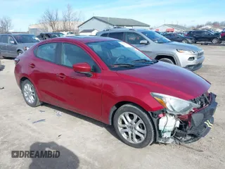 2016 Scion iA with VIN 3MYDLBZV5GY135981, listed as a IAAI auction lot 41880287 with 71,137 mi miles. Bid and sale history available at carsss.com. Image 1.