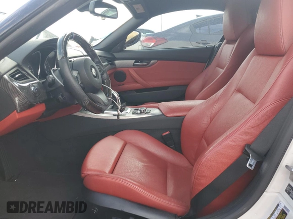 2012 BMW Z4 sDrive35i with VIN WBALM7C55CE385061, listed as a Copart auction lot 48051044 with 87,369 mi miles and Salvage Title. Bid and sale history available at carsss.com. Image 7.