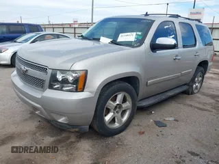 2008 Chevrolet Tahoe LTZ with VIN 1GNFC13JX8R277832, listed as a IAAI auction lot 41348121 with 210,576 mi miles and . Bid and sale history available at DreamBid. Image 2.