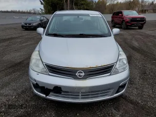 2010 Nissan Versa 1.6 with VIN 3N1CC1AP9AL355388, listed as a Copart auction lot 73171243 with 141,394 mi miles and Clean Title. Bid and sale history available at carsss.com. Image 5.