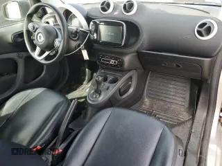 2016 Smart fortwo Passion z VIN WMEFJ5DAXGK123943, wystawiony jako Copart lot #51904865 z przebiegiem 69 821 mil mil oraz Szkody całkowita. Historia ofert i sprzedaży dostępna na DreamBid. Obrazek 8.
