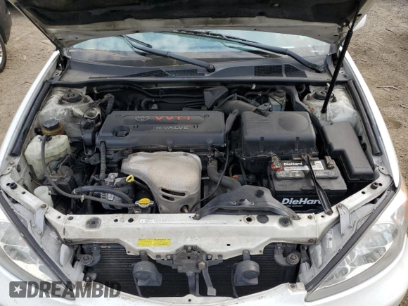 2004 Toyota Camry LE z VIN 4T1BE30K04U301360, wystawiony jako Copart lot #60804115 z przebiegiem 287 009 mil mil oraz Szkoda całkowita • Salvage title. Historia ofert i sprzedaży dostępna na DreamBid. Obrazek 11.