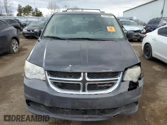 2012 Dodge Grand Caravan SE with VIN 2C4RDGBG5CR397651, listed as a Copart auction lot 52878905 with 248,103 mi miles and Clean Title. Bid and sale history available at DreamBid. Image 5.