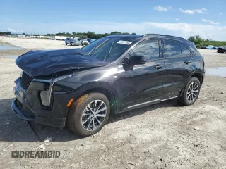 2024 Cadillac XT4 FWD Sport with VIN 1GYFZER41RF198840, listed as a Copart auction lot 76032704 with 6,604 mi miles and Salvage title. Bid and sale history available at DreamBid. Image 1.