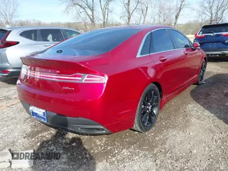 2015 Lincoln MKZ z VIN 3LN6L2G94FR619447, wystawiony jako IAAI lot #41831679 z przebiegiem 97 906 mil mil oraz . Historia ofert i sprzedaży dostępna na DreamBid. Obrazek 4.