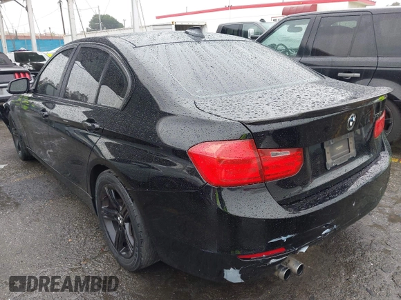 2015 BMW 3 Series 328i with VIN WBA3A5C59FF606236, listed as a IAAI auction lot 41690502 with 115,085 mi miles. Bid and sale history available at carsss.com. Image 3.