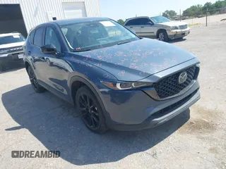 2024 Mazda CX-5 S Carbon Edition z VIN JM3KFBCL9R0520081, wystawiony jako IAAI lot #42367365 z przebiegiem 20 492 mil mil oraz . Historia ofert i sprzedaży dostępna na DreamBid. Obrazek 1.
