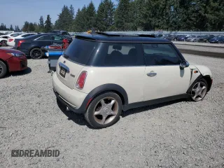2006 MINI Hardtop with VIN WMWRC33586TJ77908, listed as a Copart auction lot 55095525 with 143,810 mi miles and Salvage title. Bid and sale history available at DreamBid. Image 3.