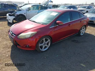 2014 Ford Focus Titanium with VIN 1FADP3J2XEL247827, listed as a IAAI auction lot 41959720 with 105,373 mi miles. Bid and sale history available at carsss.com. Image 2.