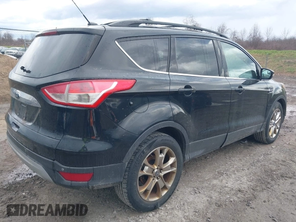 2013 Ford Escape SEL with VIN 1FMCU9HX9DUA69853, listed as a IAAI auction lot 42037021 with 132,166 mi miles and . Bid and sale history available at DreamBid. Image 4.