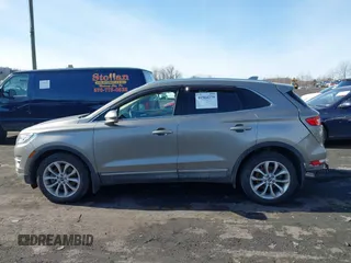 2016 Lincoln MKC Select with VIN 5LMCJ2D95GUJ08172, listed as a IAAI auction lot 41504279 with 73,425 mi miles and . Bid and sale history available at DreamBid. Image 14.