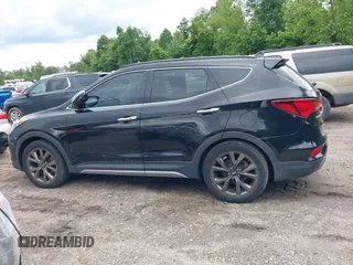 2017 Hyundai Santa Fe Ultimate z VIN 5XYZW4LA9HG416653, wystawiony jako IAAI lot #42350652 z przebiegiem 122 000 mil mil oraz . Historia ofert i sprzedaży dostępna na DreamBid. Obrazek 14.