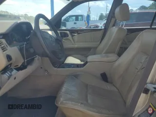 1997 Mercedes-Benz E 320 with VIN WDBJF72F0VA262484, listed as a Copart auction lot 54346945 with 145,352 mi miles and Salvage Title. Bid and sale history available at DreamBid. Image 7.