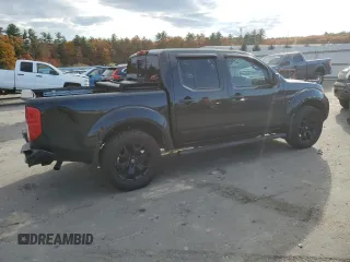 2020 Nissan Frontier Pro-4X with VIN 1N6ED0EB3LN710650, listed as a Copart auction lot 77419464 with 97,399 mi miles and Salvage title. Bid and sale history available at DreamBid. Image 3.