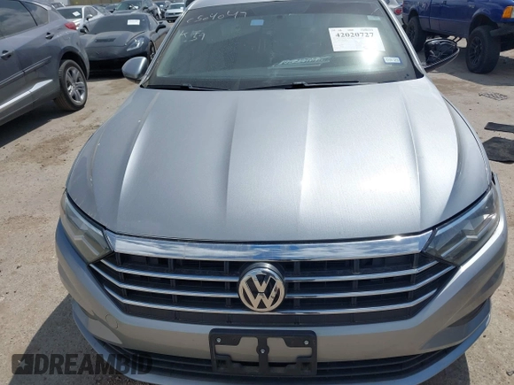 2021 Volkswagen Jetta S z VIN 3VWC57BU9MM015930, wystawiony jako IAAI lot #42020727 z przebiegiem 67 982 mil mil oraz . Historia ofert i sprzedaży dostępna na DreamBid. Obrazek 12.