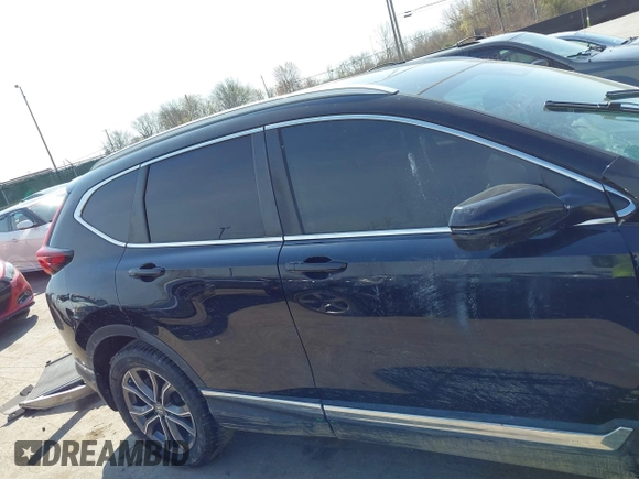 2021 Honda CR-V Touring with VIN 5J6RW2H94ML013546, listed as a IAAI auction lot 42058560 with 22,454 mi miles. Bid and sale history available at carsss.com. Image 14.